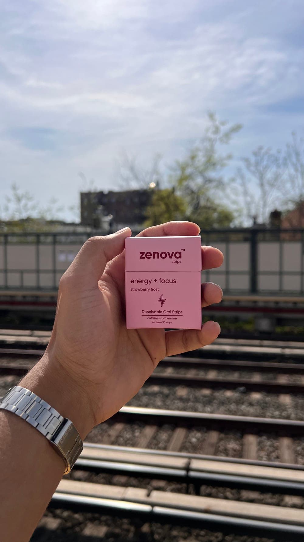 Zenova box held up at a train platform